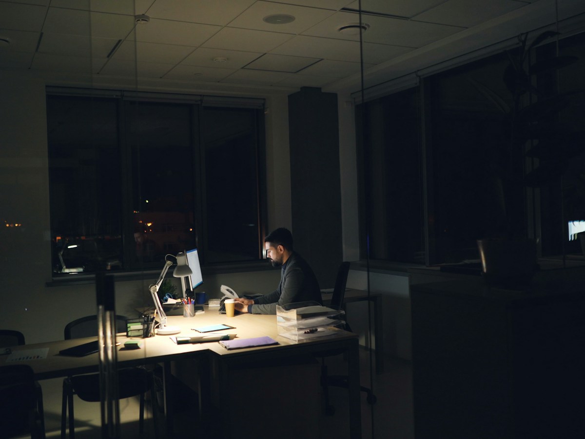 Arth advisor working late at a desk